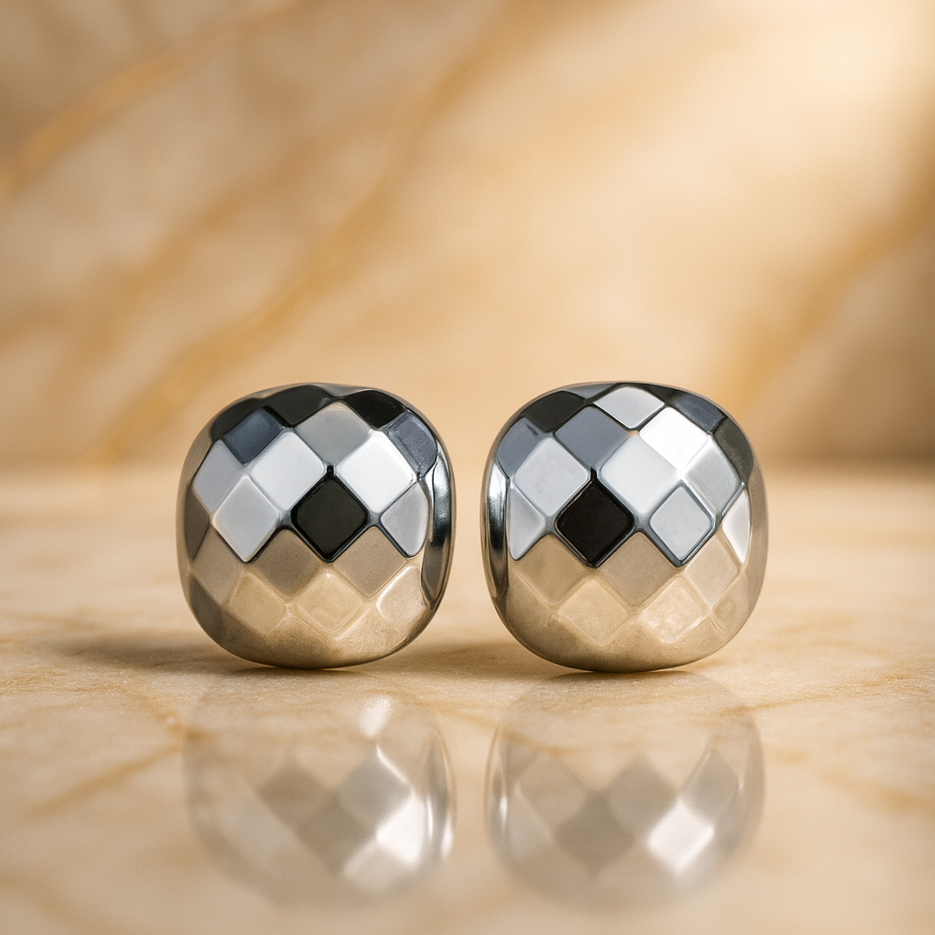 Chrome Charm silver dome earrings with quilted check-pattern design on satin background – minimal, luxury jewelry by Ora Haven