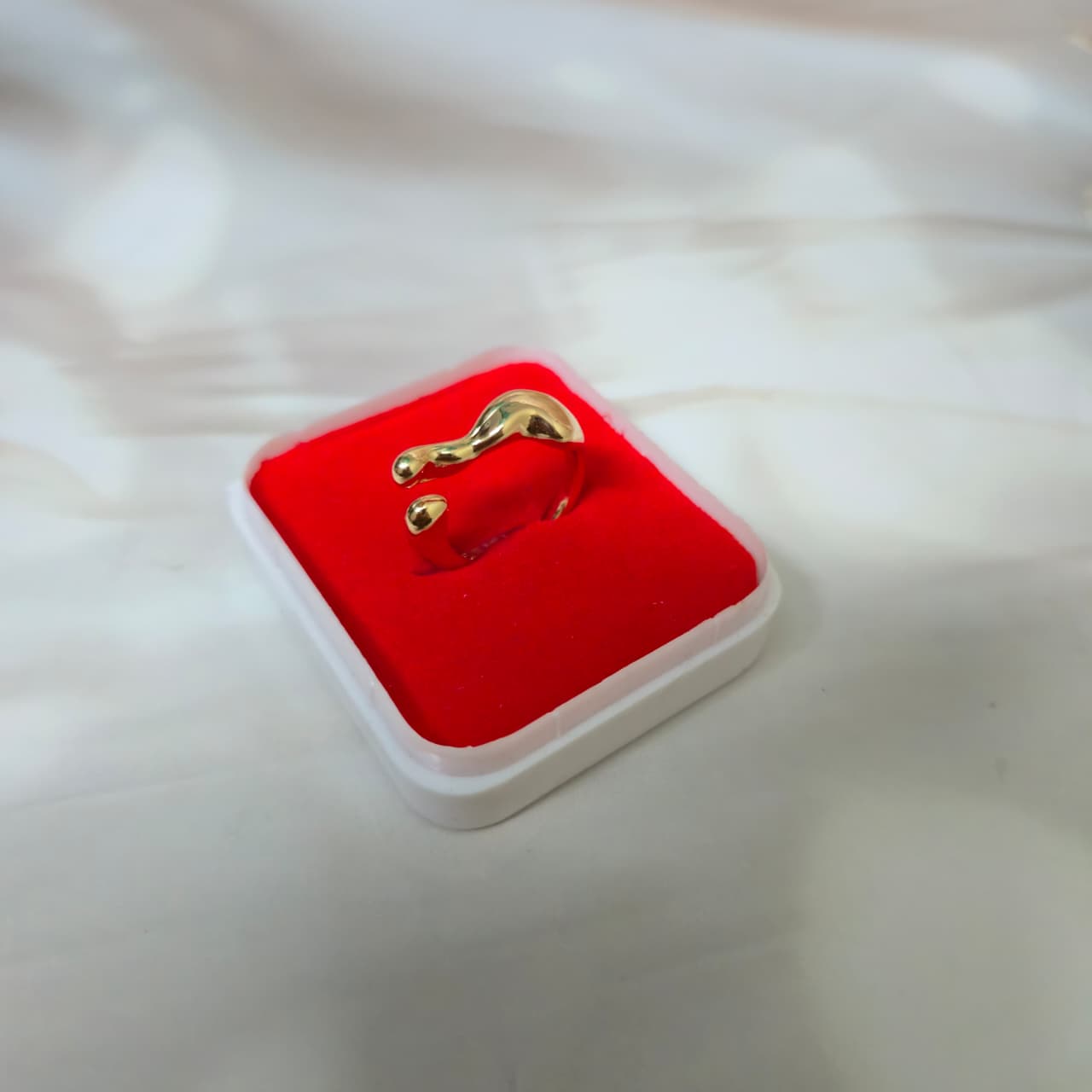 Gold-toned adjustable open curve ring with anti-tarnish finish