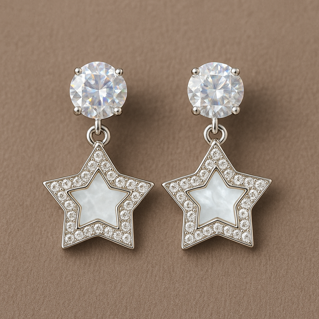 Star-shaped drop earrings with a mother-of-pearl center, surrounded by sparkling crystals, and topped with dazzling round studs for a glamorous finish