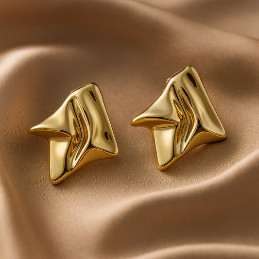 Radiant Fold Earrings – sculptural gold abstract earrings with molten fold design, luxury statement jewelry by Ora Haven.