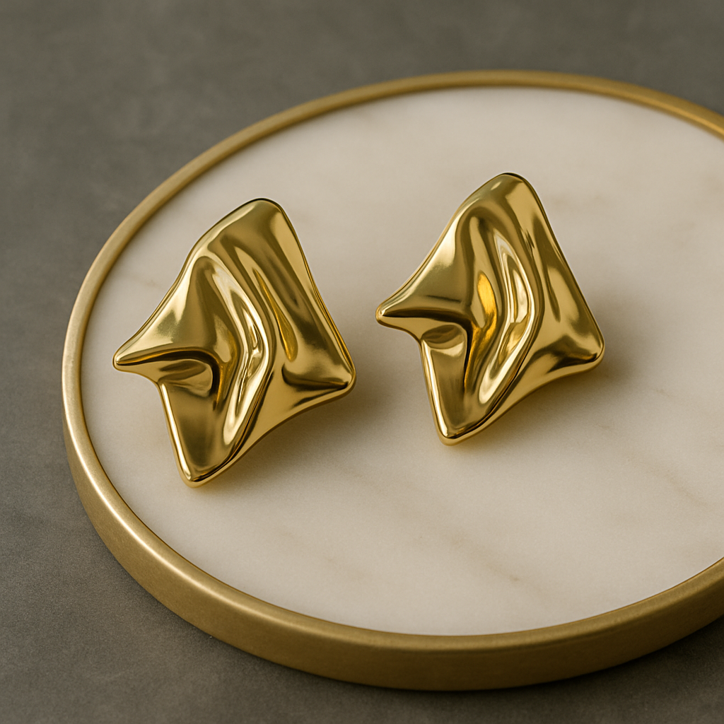 Radiant Fold Earrings – sculptural gold abstract earrings with molten fold design, luxury statement jewelry by Ora Haven.
