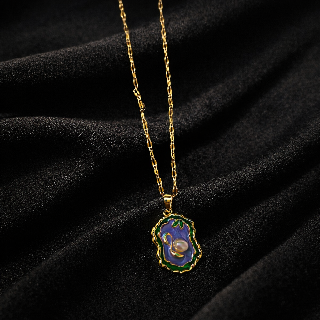 The pendant on a black cloth background