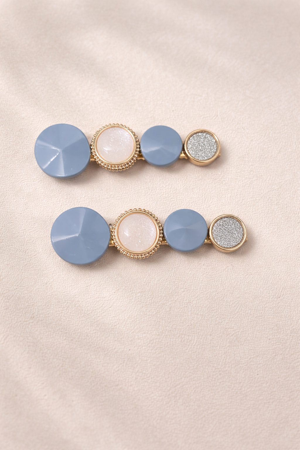 The hair clip on a rose background 