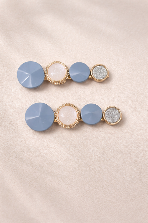 The hair clip on a rose background 