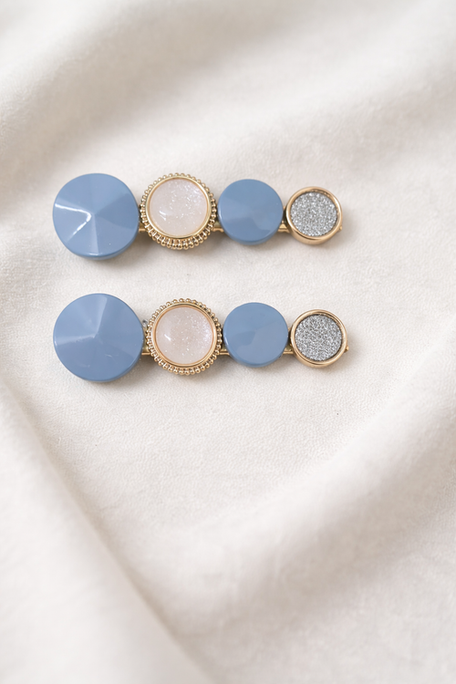 The hair clip on a white cloth background 