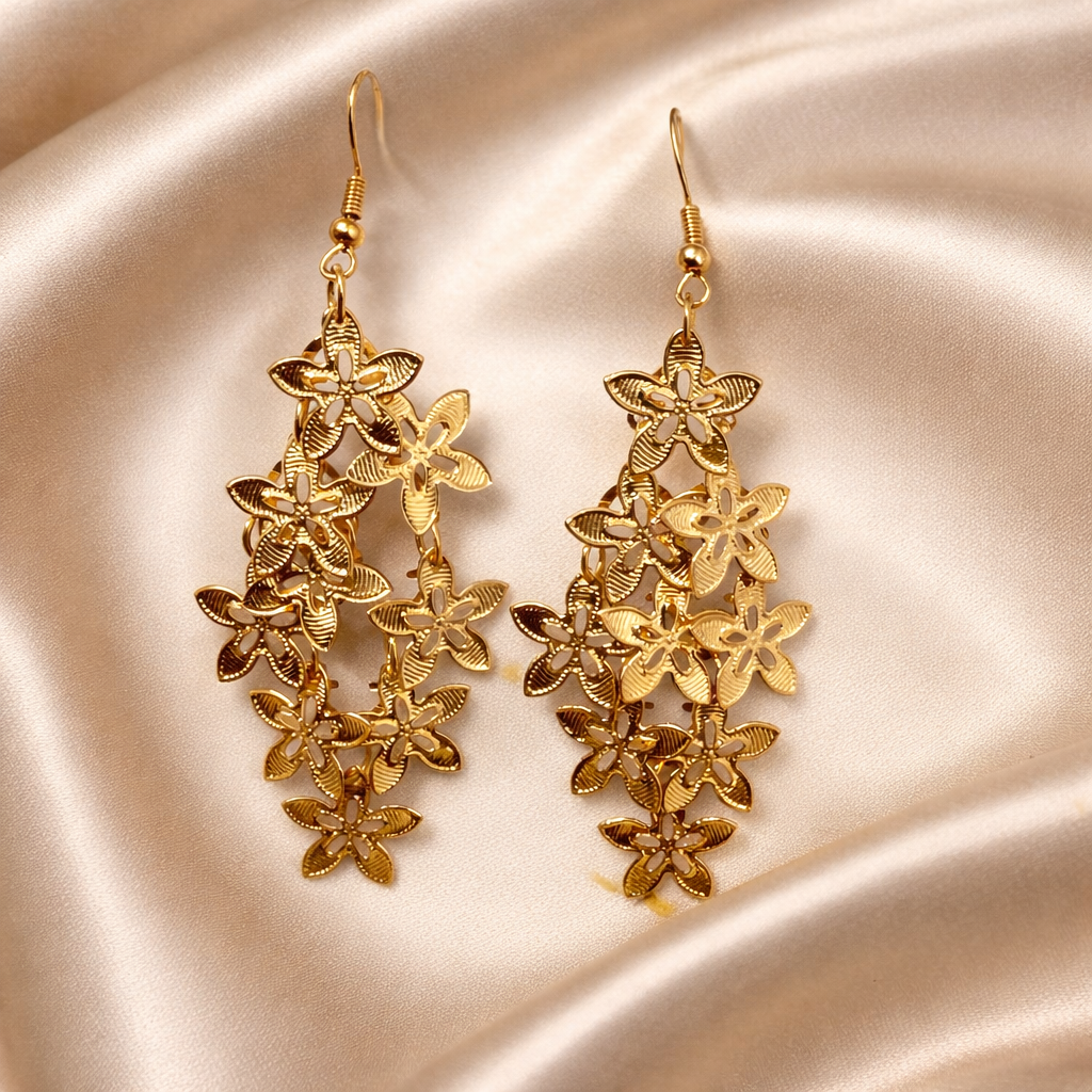 The earings on a rose background 