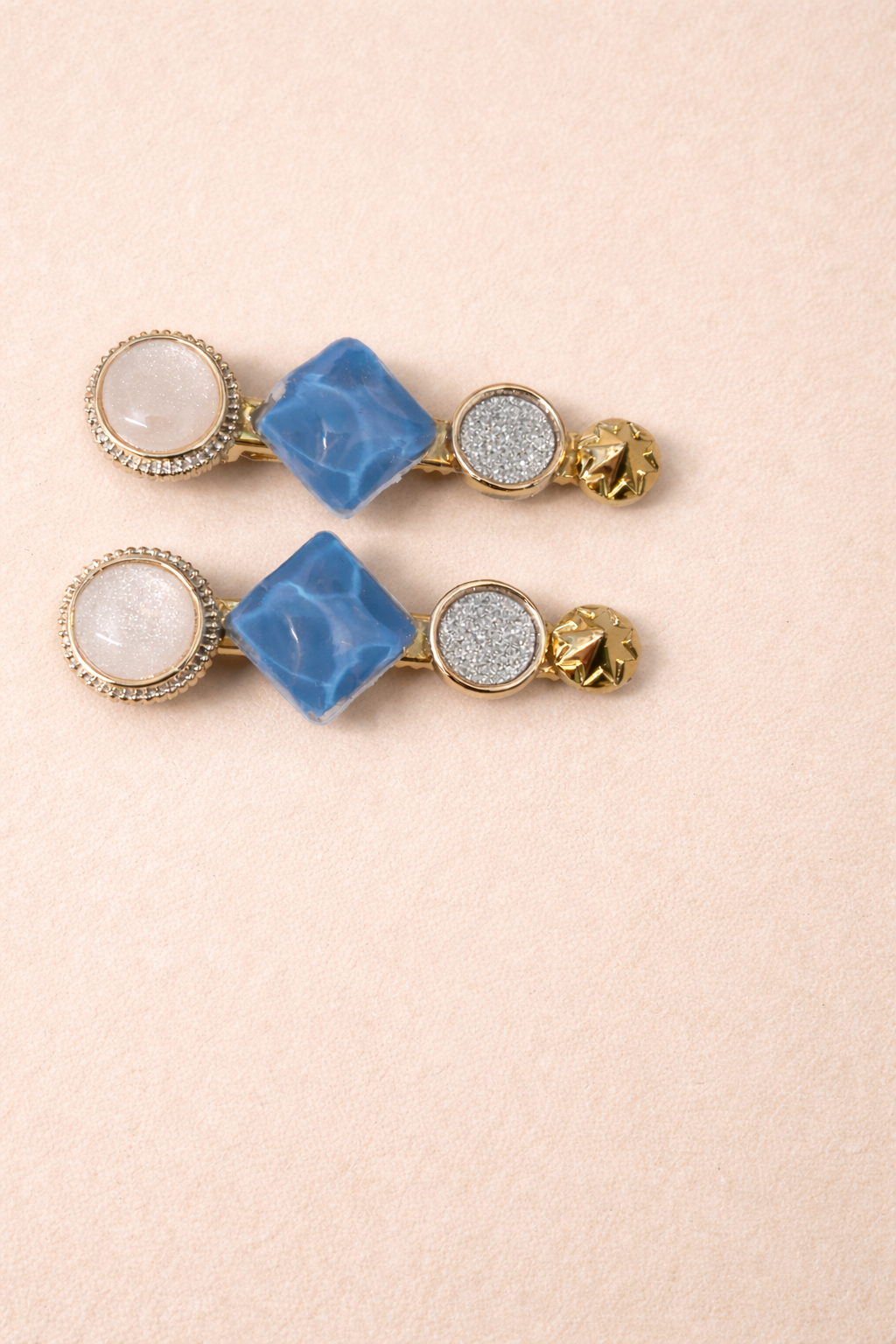 The hair clip on a rose background 