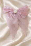 The bow on a satin cloth background 