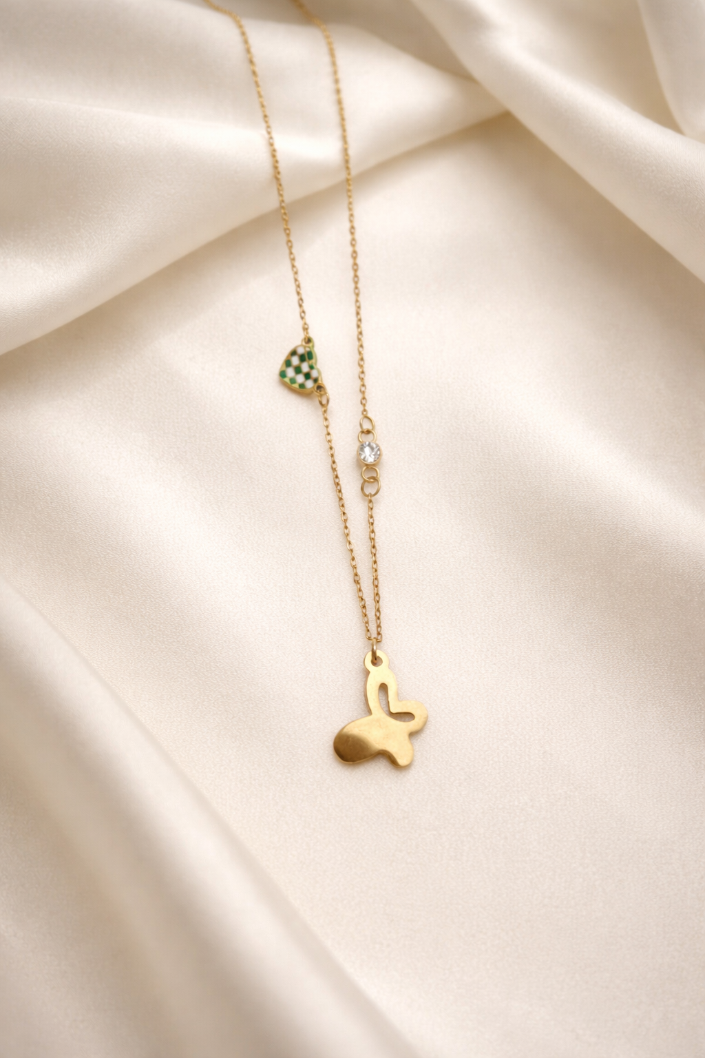 The pendant on a white cloth background 