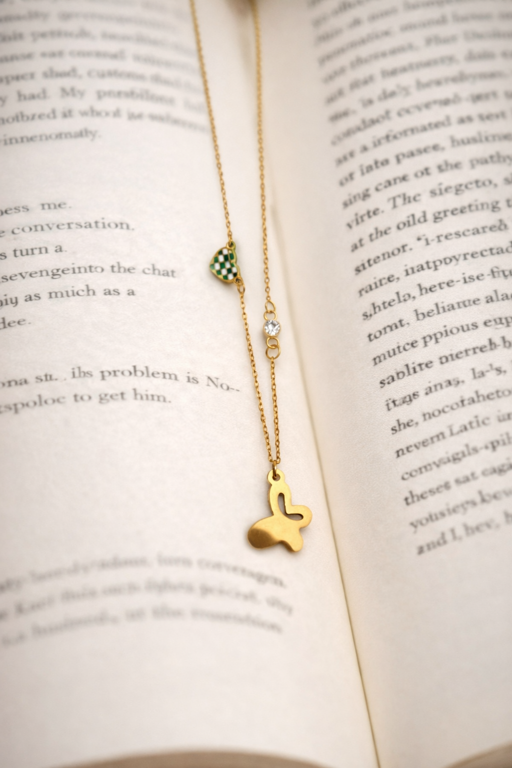 The pendant on an open book background 