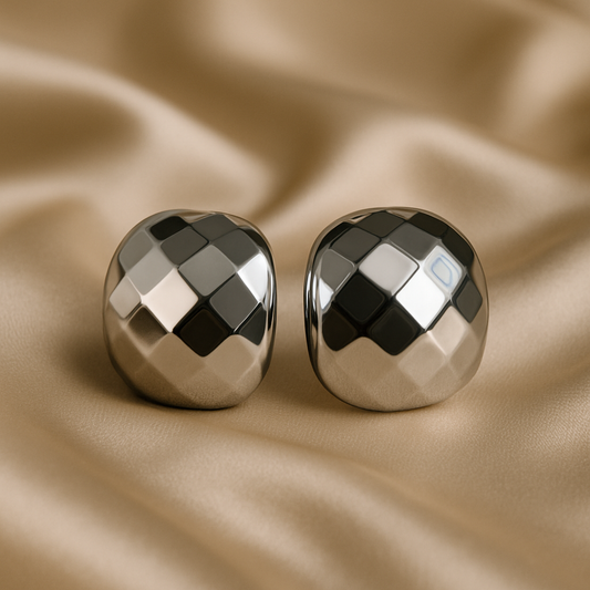 Chrome Charm silver dome earrings with quilted check-pattern design on satin background – minimal, luxury jewelry by Ora Haven