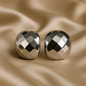 Chrome Charm silver dome earrings with quilted check-pattern design on satin background – minimal, luxury jewelry by Ora Haven