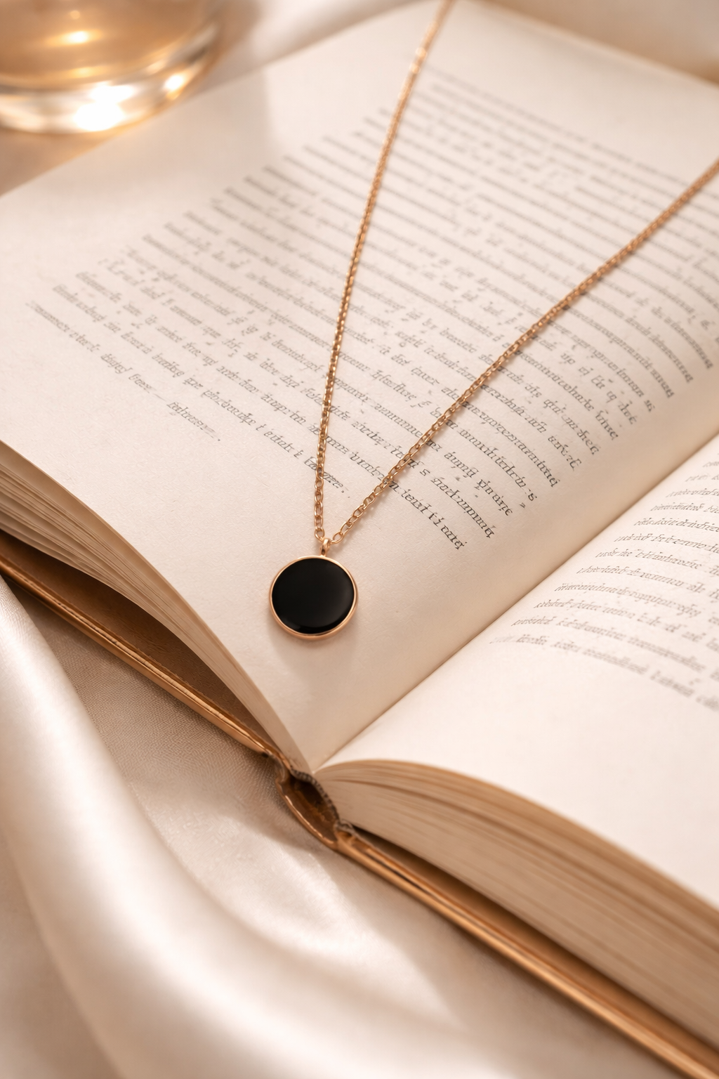 The pendant on a book.