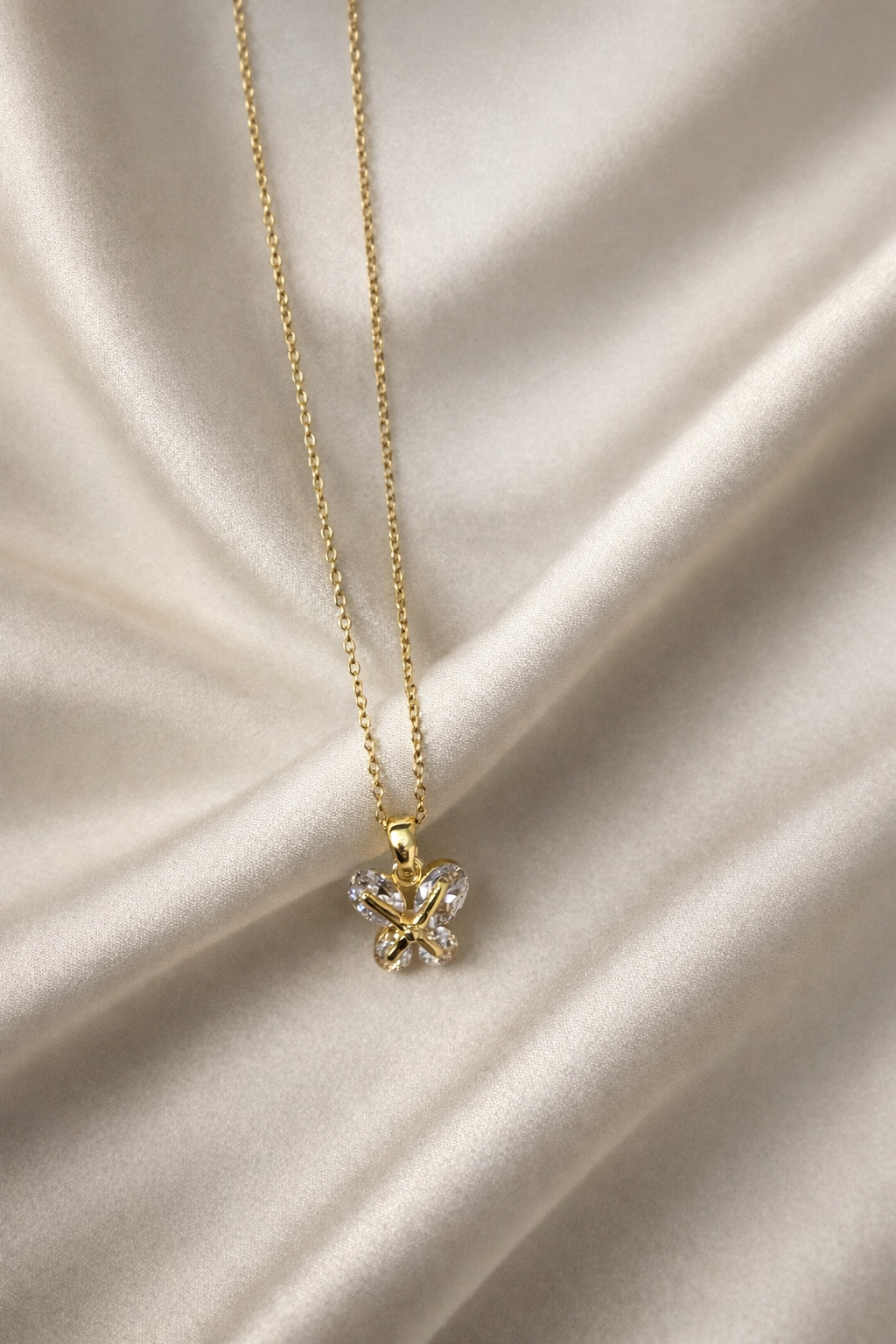 The pendant on a white cloth background 