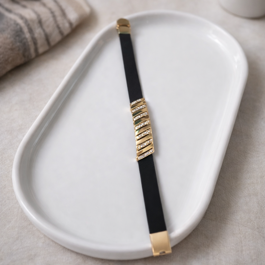 the bracelet on a white plate 