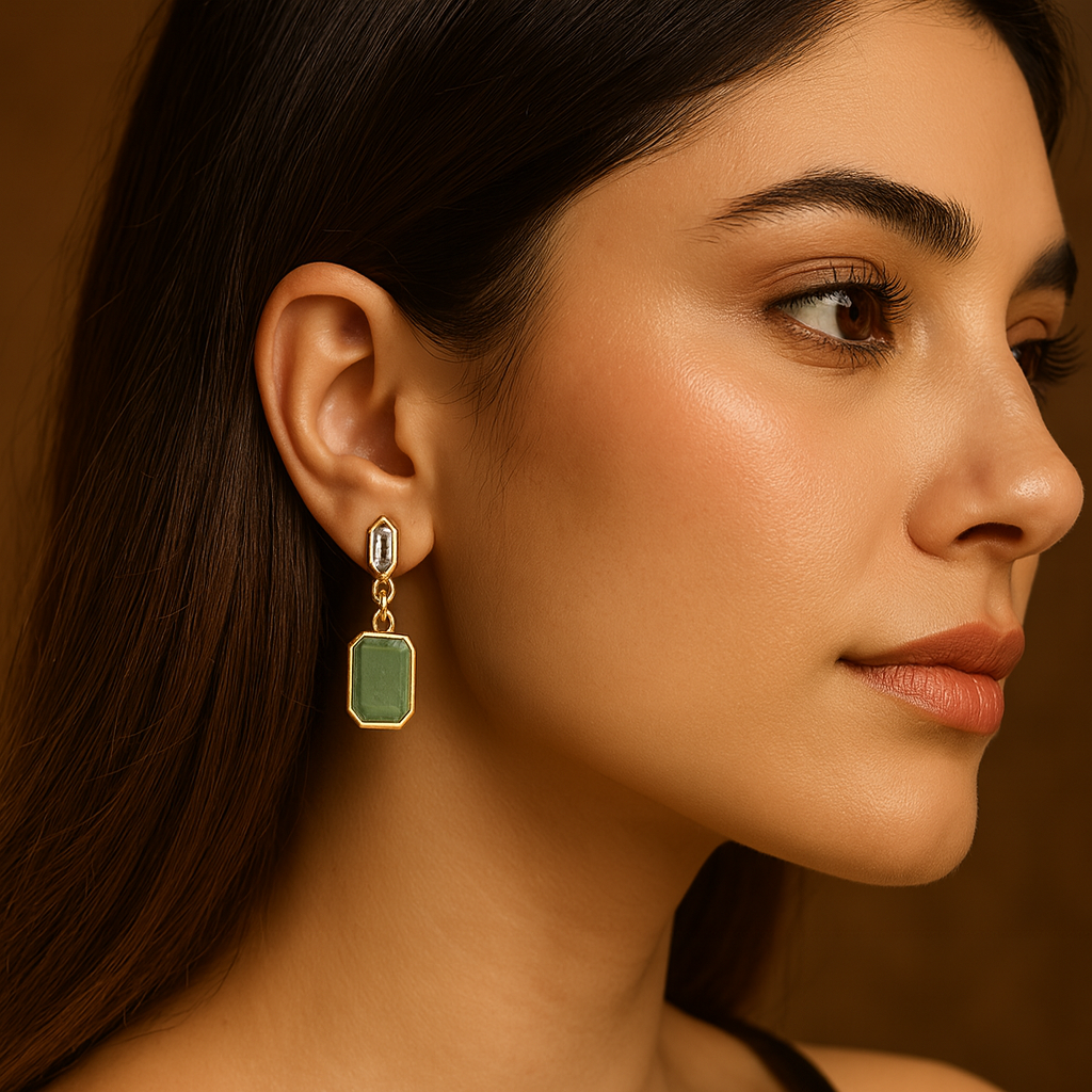 Gold earrings with green gemstones 