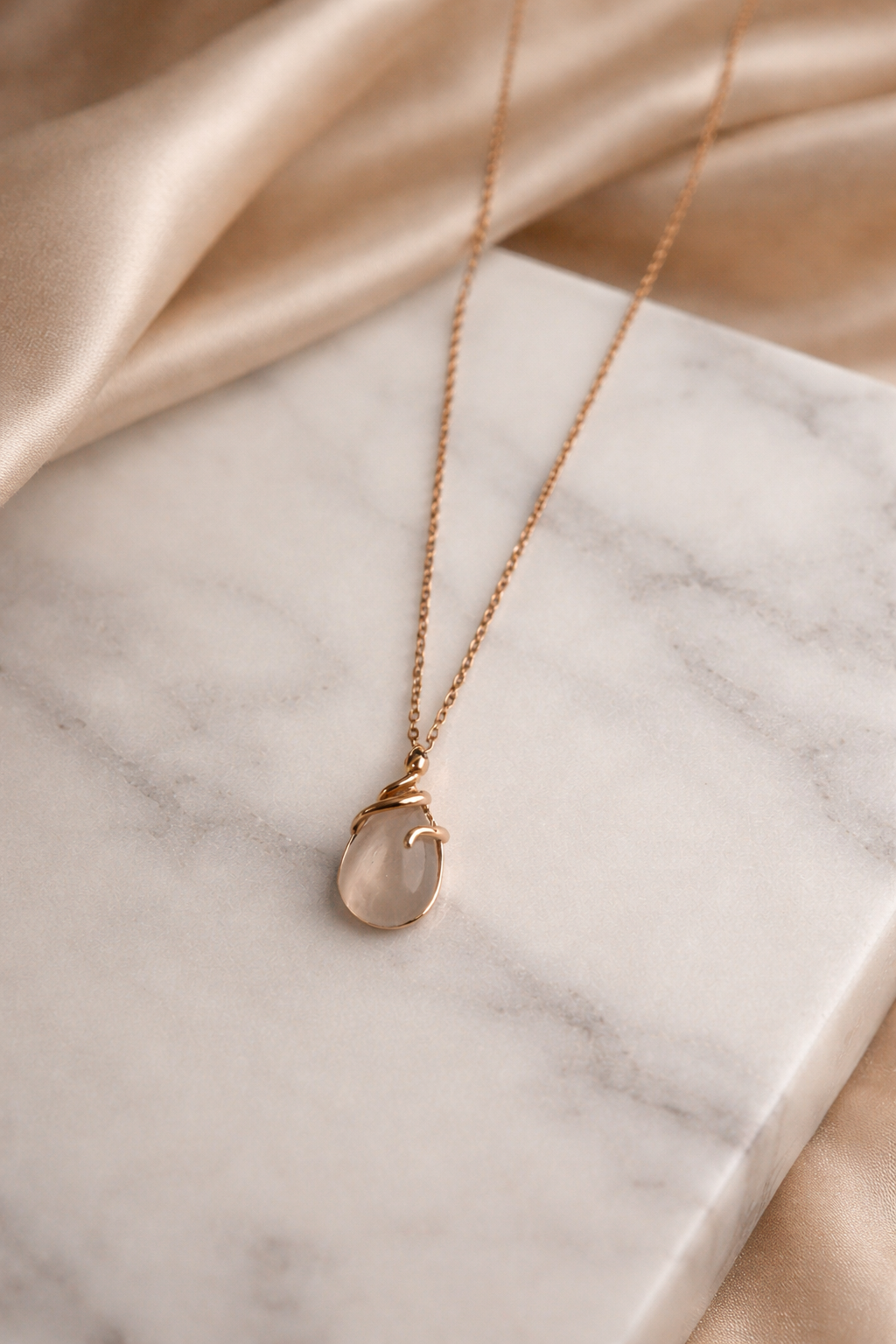 The pendant on a marble background 