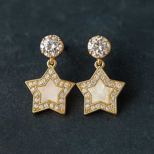 Star-shaped earrings with gold frames and clear gemstones on a dark background