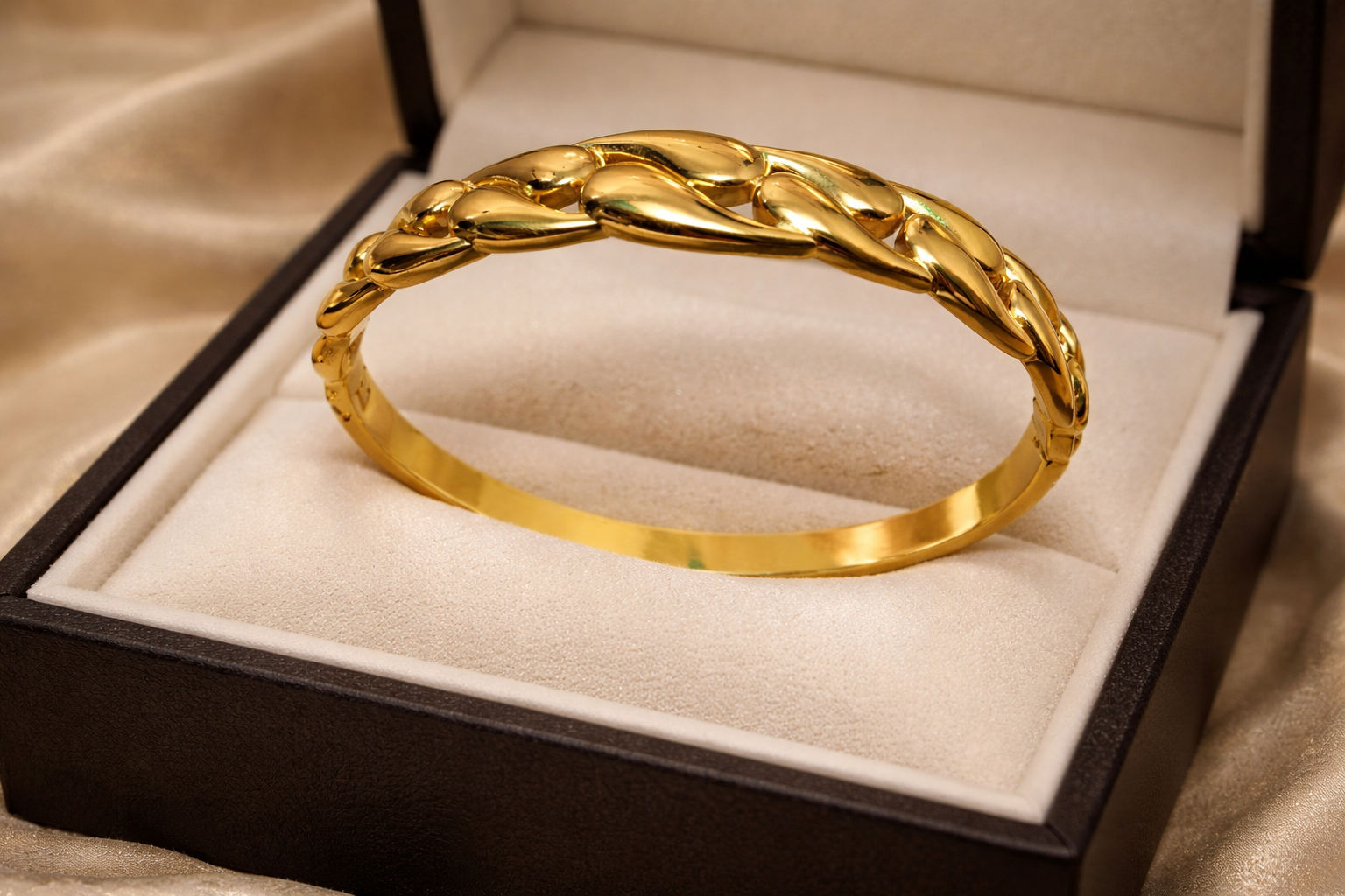 Gold bracelet in a box.