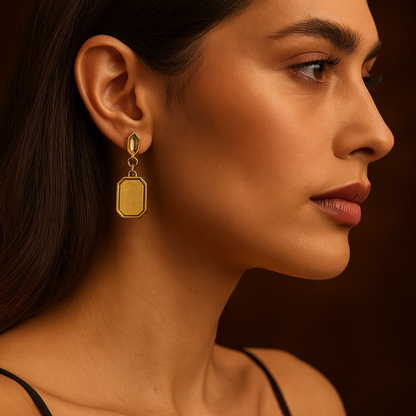 Pair of gold earrings with a geometric design 