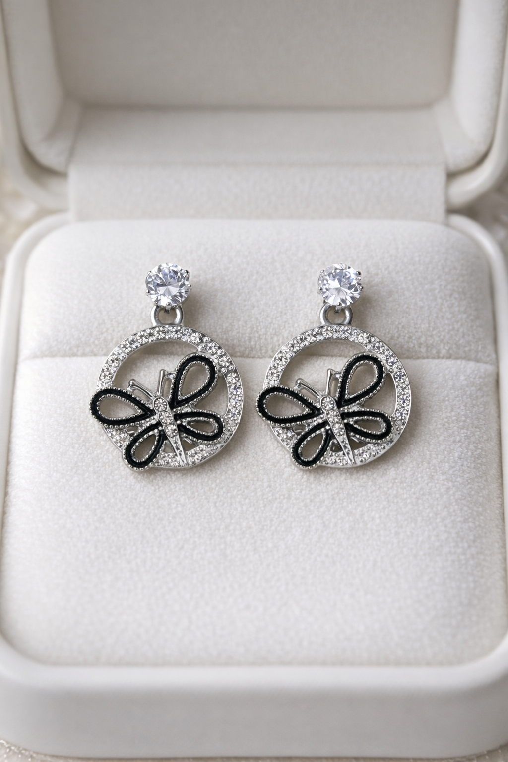 The earrings on a jewelry box 