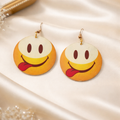 The earings on a white cloth background