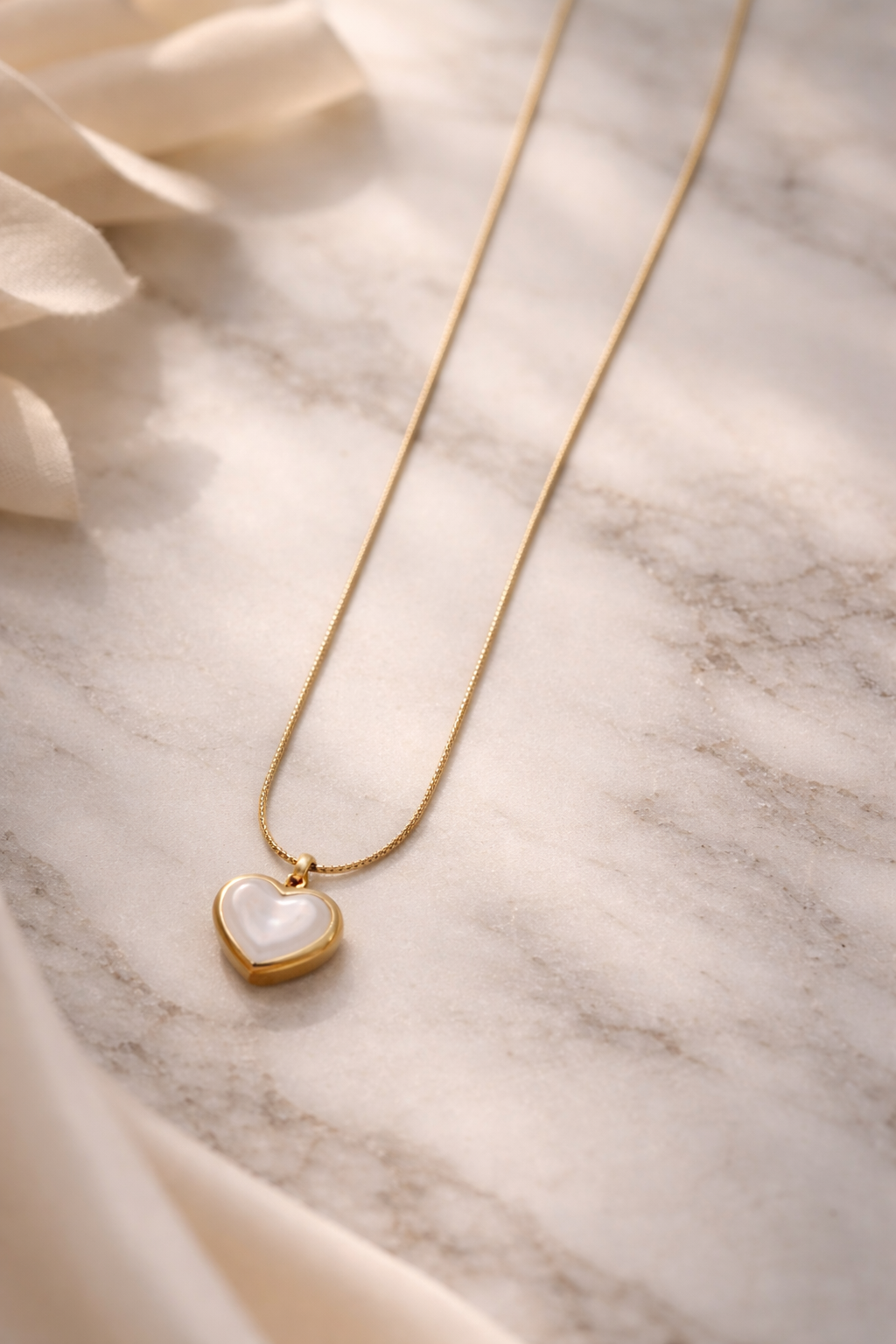 the pendent on a marble background.