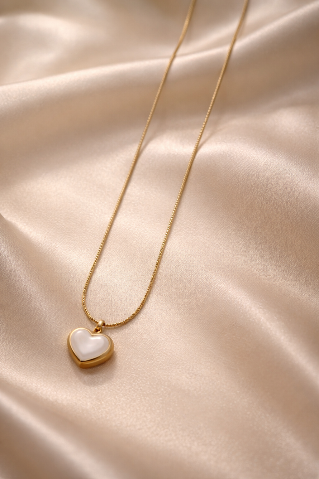 the pendent on a cloth  background.