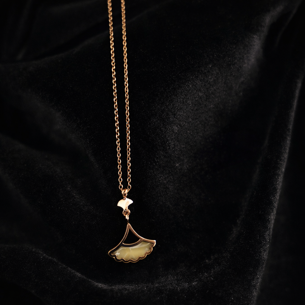 The pendant on a black cloth background 