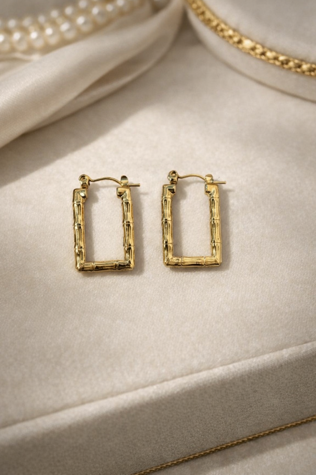 The earings on a cloth background 