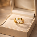 The gold ring inside a jewelry box 