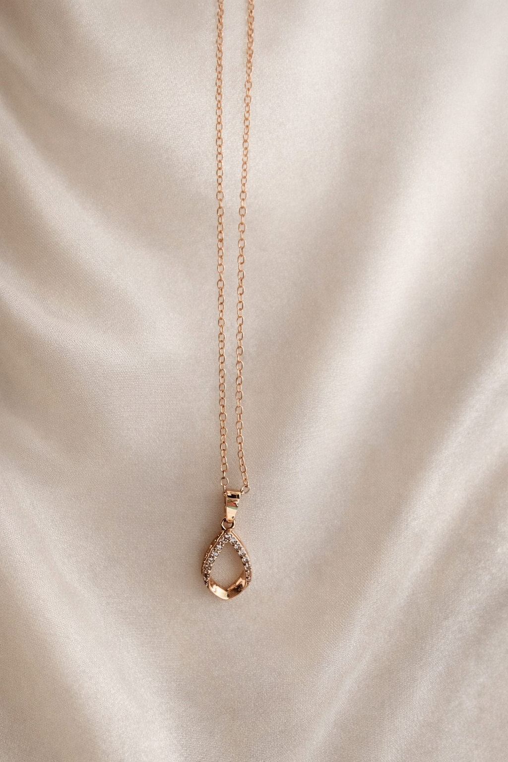 The pendant on a white cloth background 