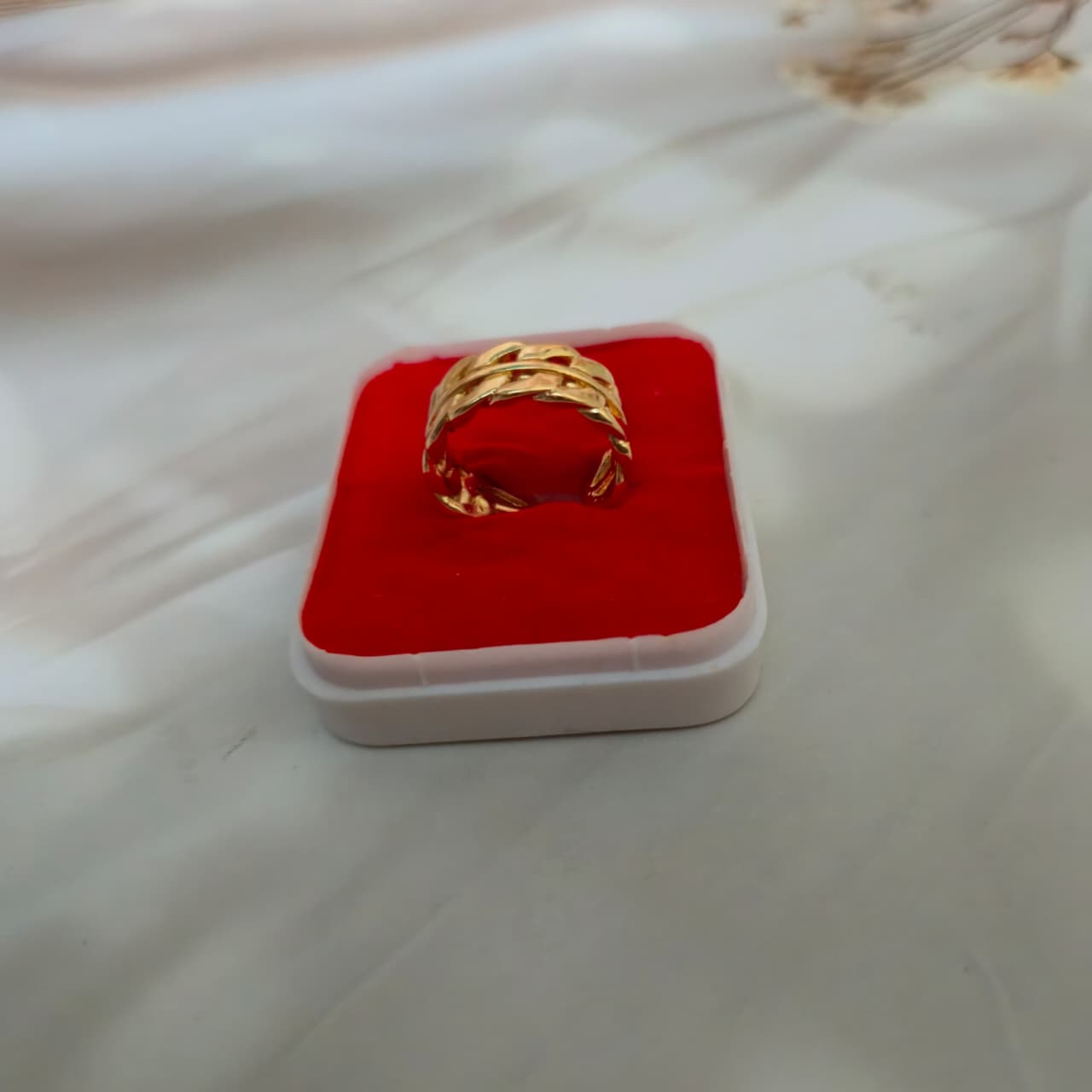 Luxury gold-toned adjustable twist ring with layered design