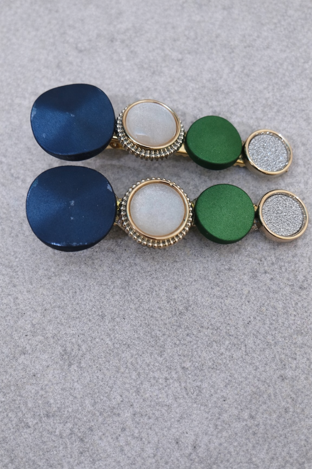 The hair clip on a stone background 