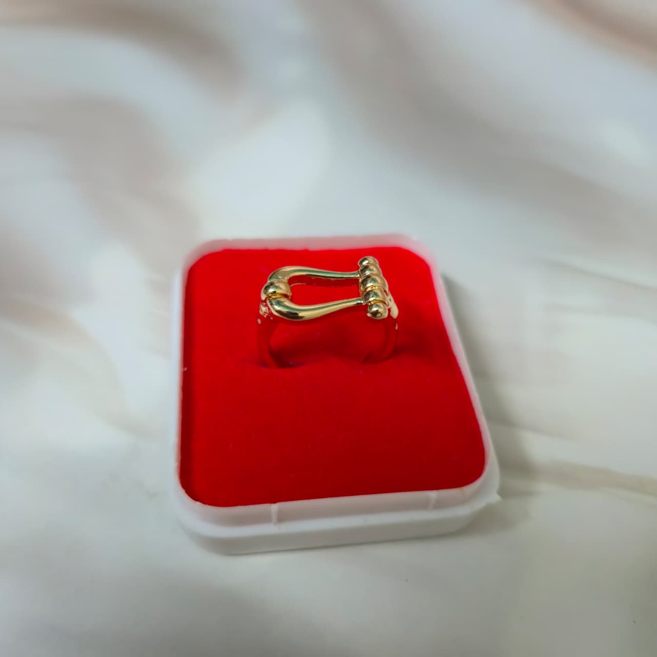 Minimal curved adjustable ring with anti-tarnish finish by Ora Haven