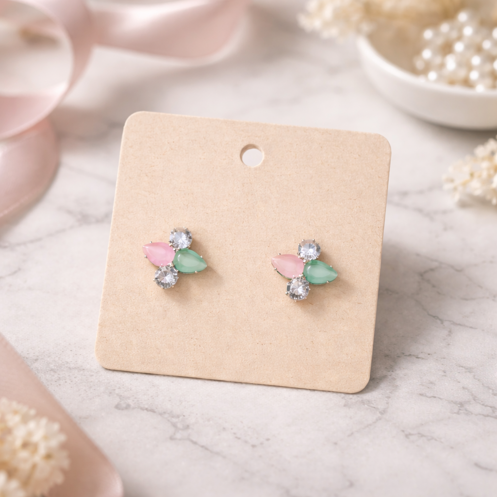 The earrings on a marble background 