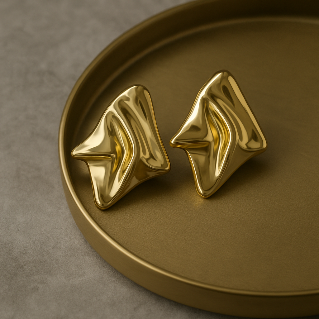 Radiant Fold Earrings – sculptural gold abstract earrings with molten fold design, luxury statement jewelry by Ora Haven.