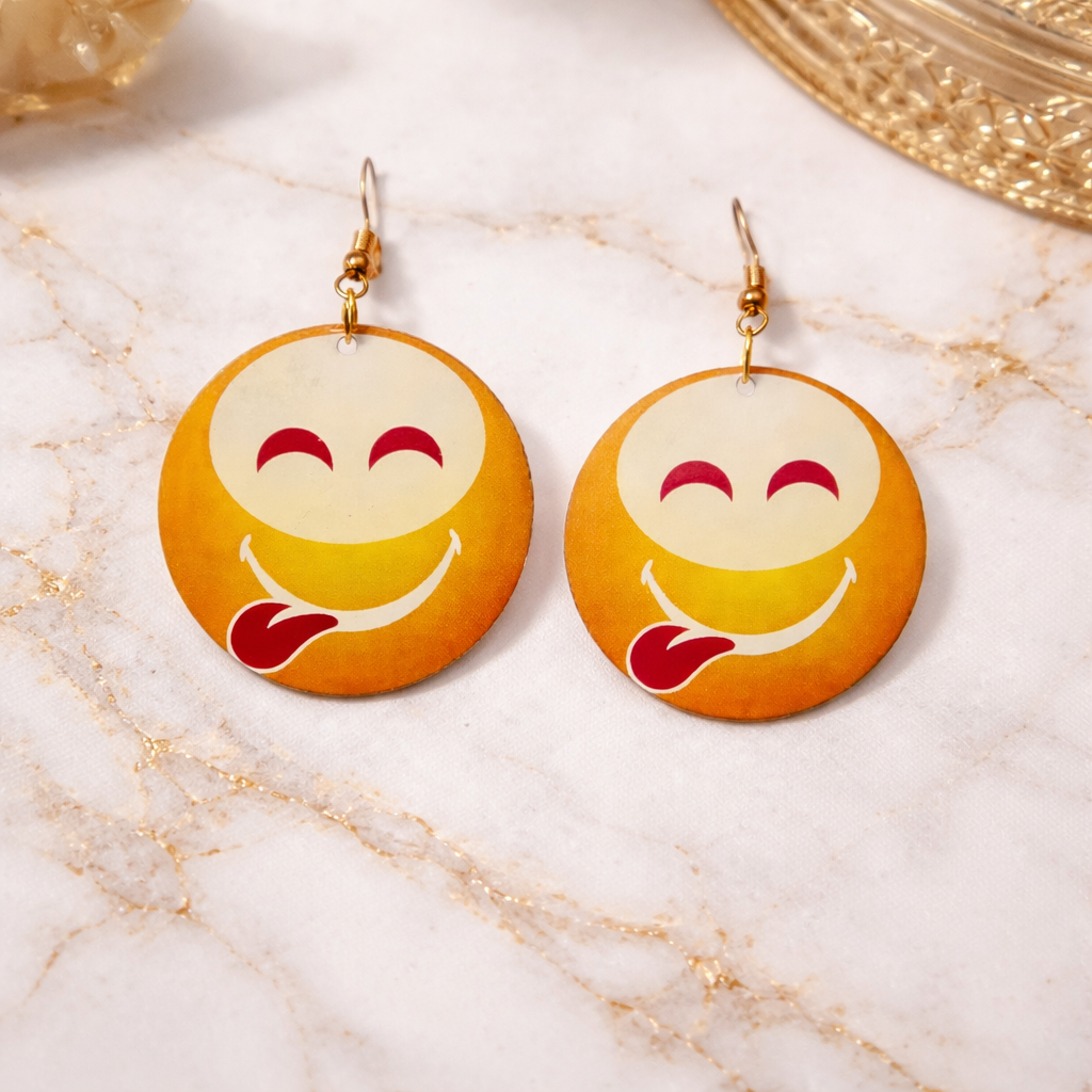 The earings on a white marble background 