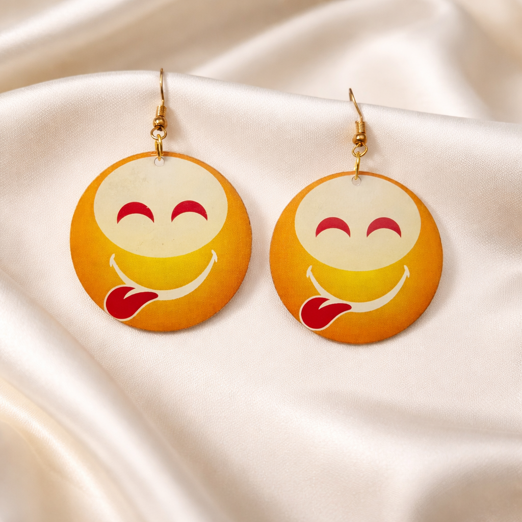 The earings on a white cloth background