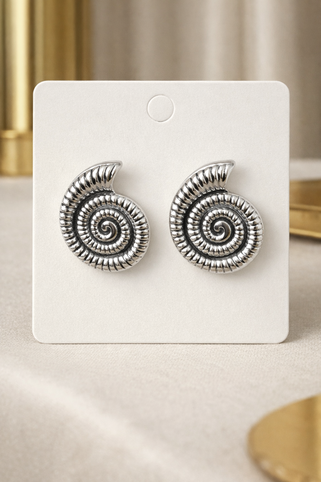 The earrings on a white background 