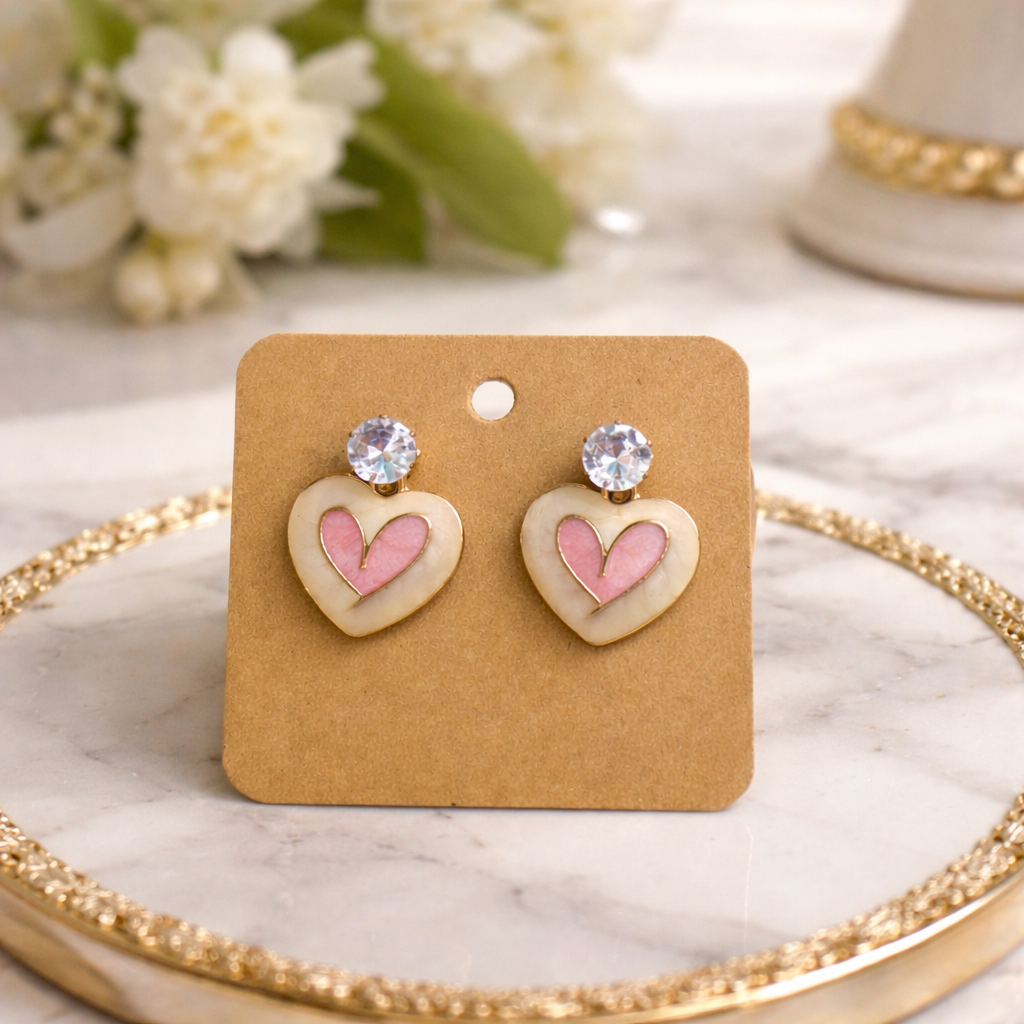 The earrings on a marble background 