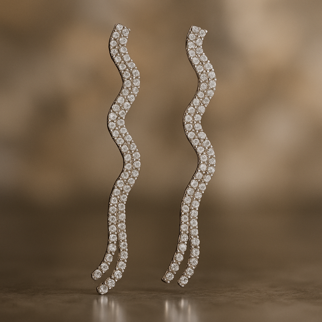 Pair of diamond earrings on a brown background