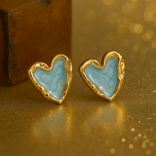 Pair of heart-shaped stud earrings with glossy Aqua enamel centers and textured gold-toned edges