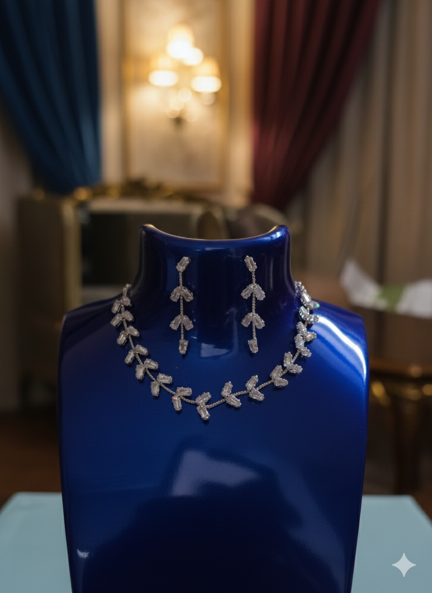 Jewelry set on a blue mannequin bust with a blurred indoor background