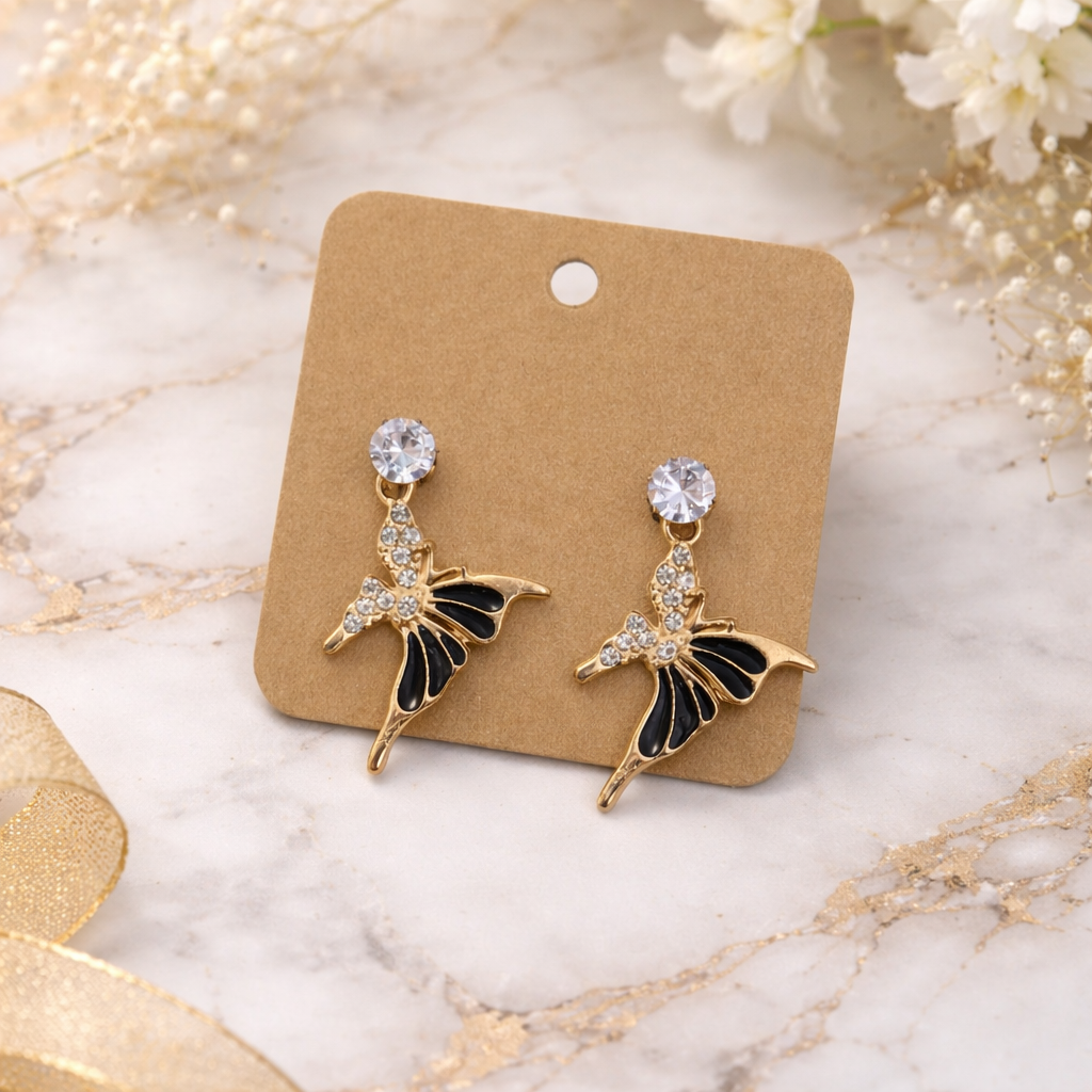 The earrings on a marble background 